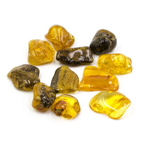Ambre - résine fossile dorée, chaleur et protection du plexus solaire